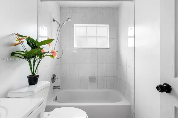 a view of wooden floor in an empty room