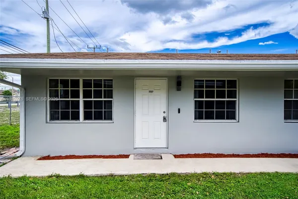 a view of an outdoor space pool patio and outdoor seating