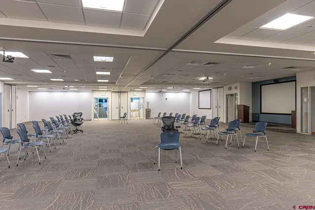 a large room with gym equipment