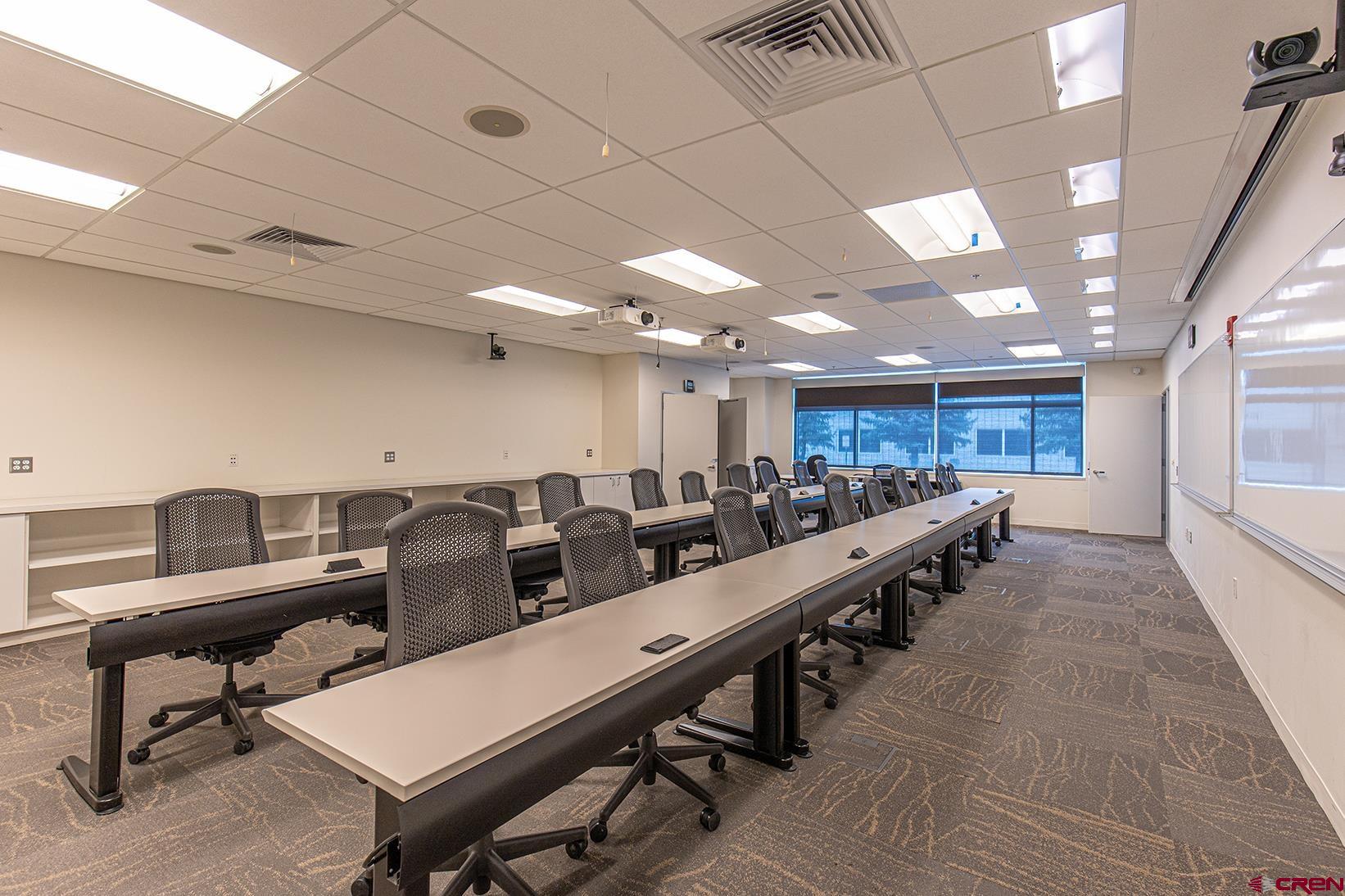 380 Airport Road Ignacio, CO 81137 - Photo 13 of 25 a large room with gym equipment