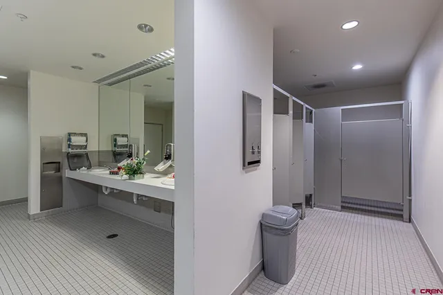 a view of parking garage with cars