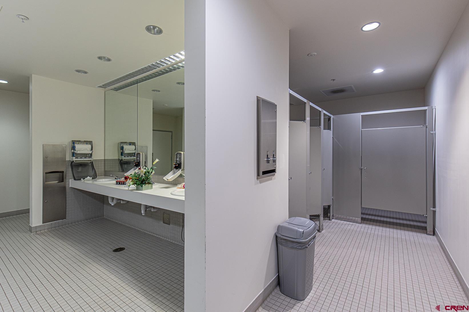 380 Airport Road Ignacio, CO 81137 - Photo 16 of 25 a bathroom with a sink a toilet and shower