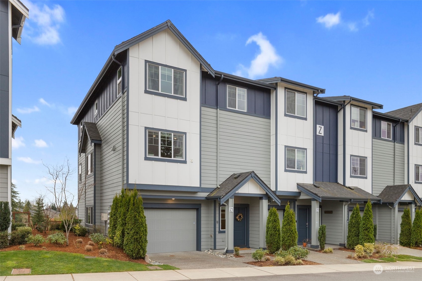 1621 Seattle Hill Road, Unit Z1 Bothell, WA 98012 - Photo 1 of 1 a front view of a house