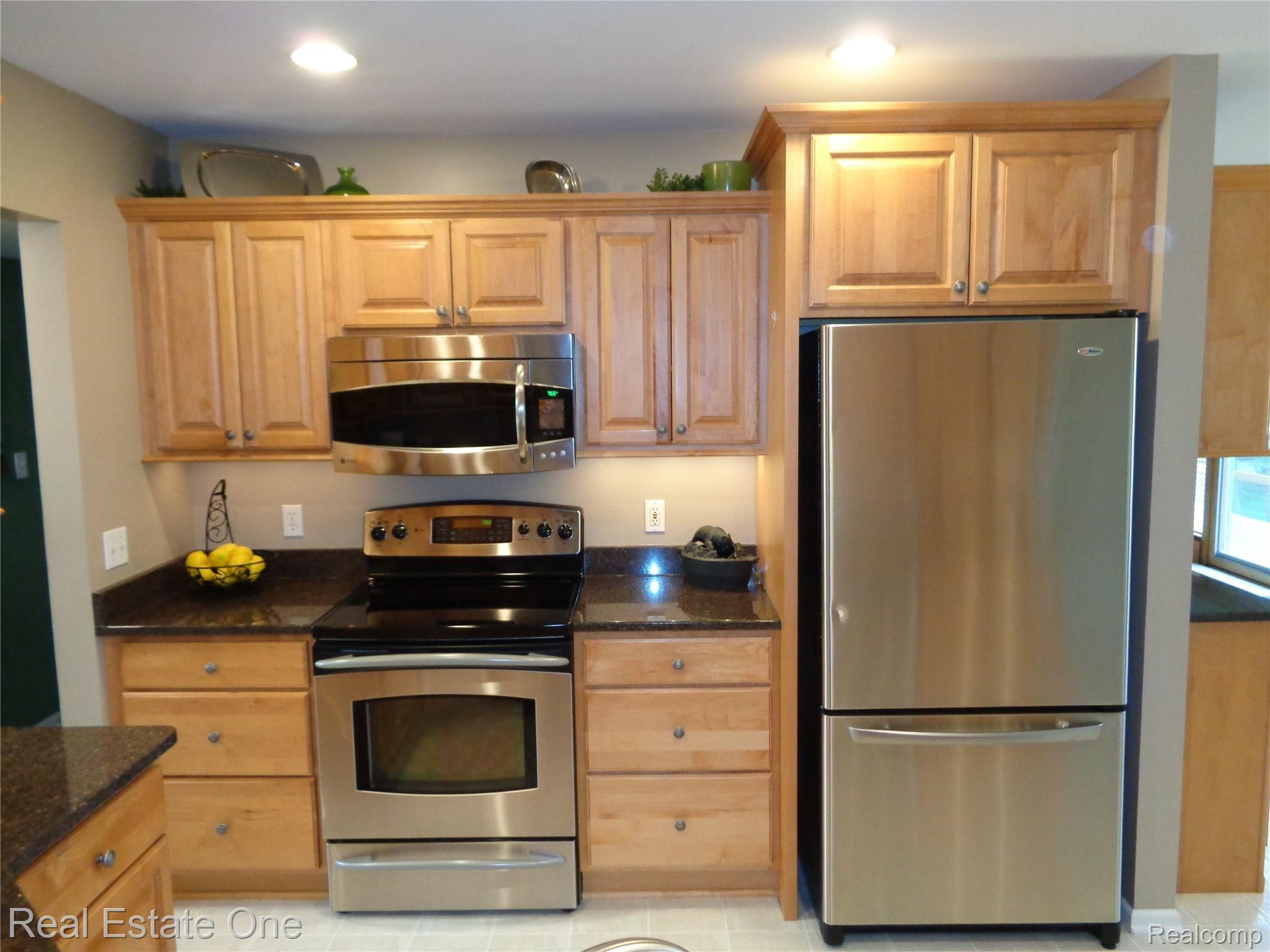 2572 Lake George Road Oakland, MI 48363 - Photo 14 of 83 All stainless appliances
