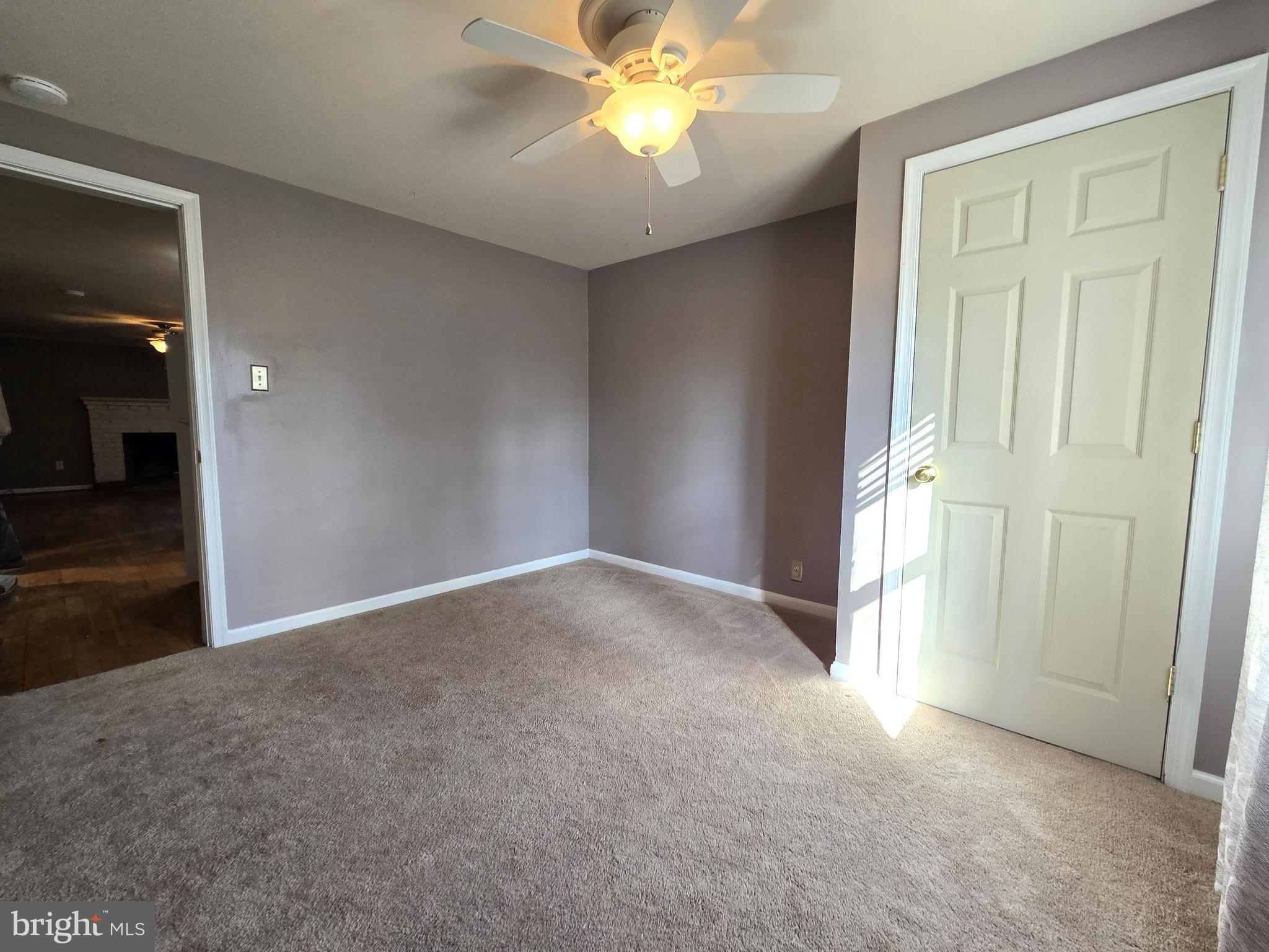 803 Tomahawk Trail Winchester, VA 22602 - Photo 17 of 20 an empty room with closet and a chandelier fan