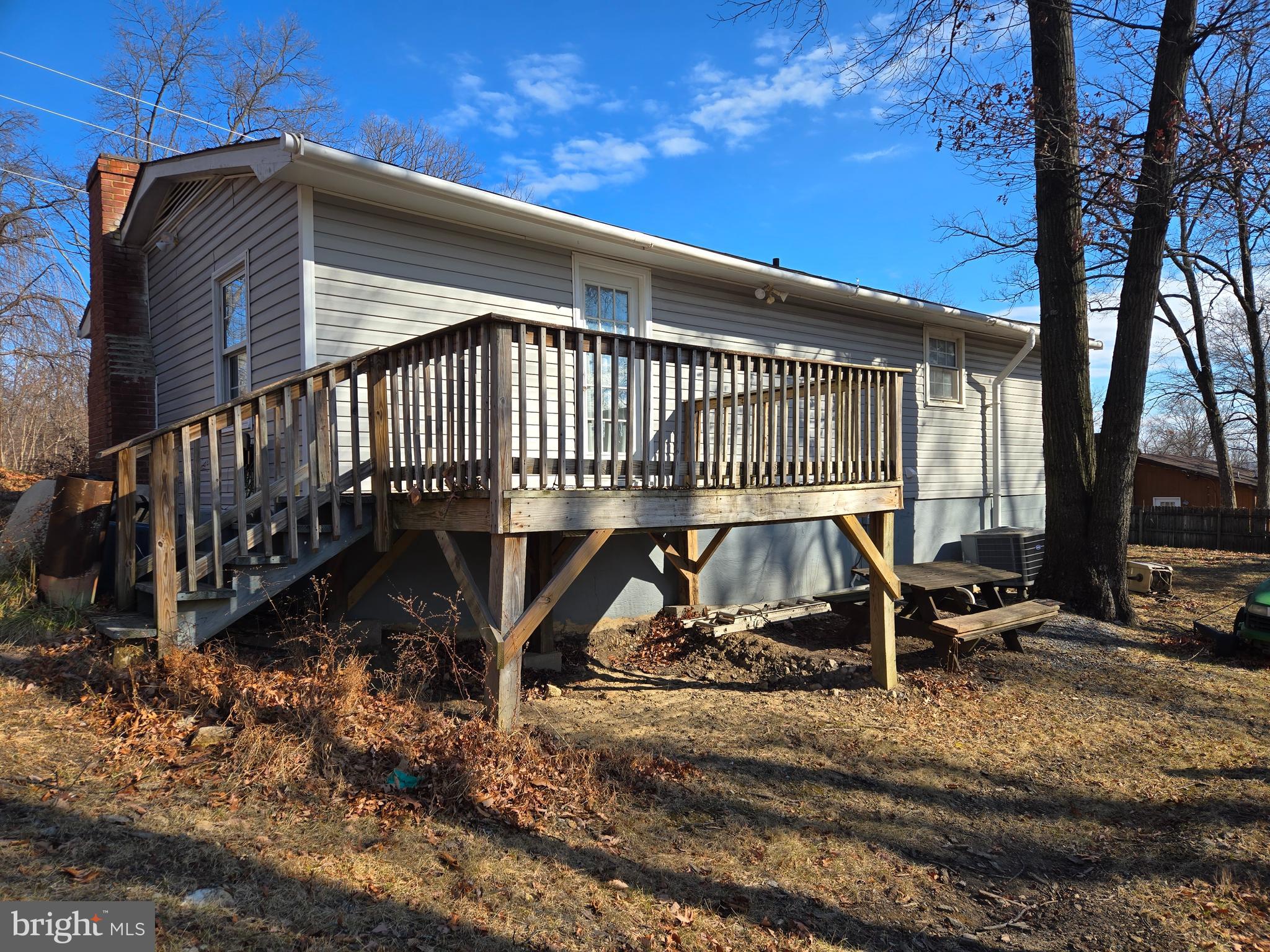803 Tomahawk Trail Winchester, VA 22602 - Photo 19 of 20 a view of a house with a small yard and wooden floor