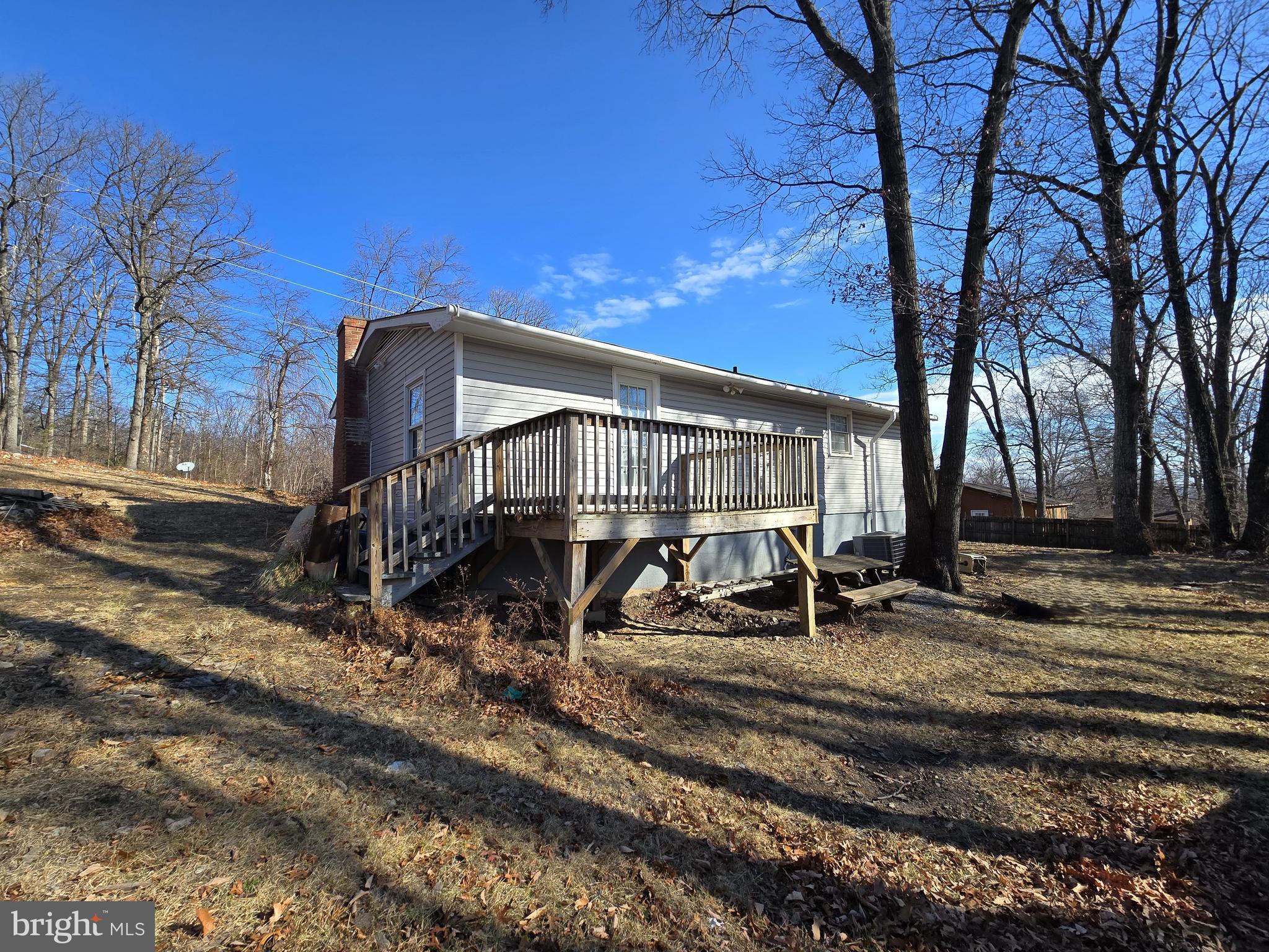 803 Tomahawk Trail Winchester, VA 22602 - Photo 20 of 20 a house with trees in the background