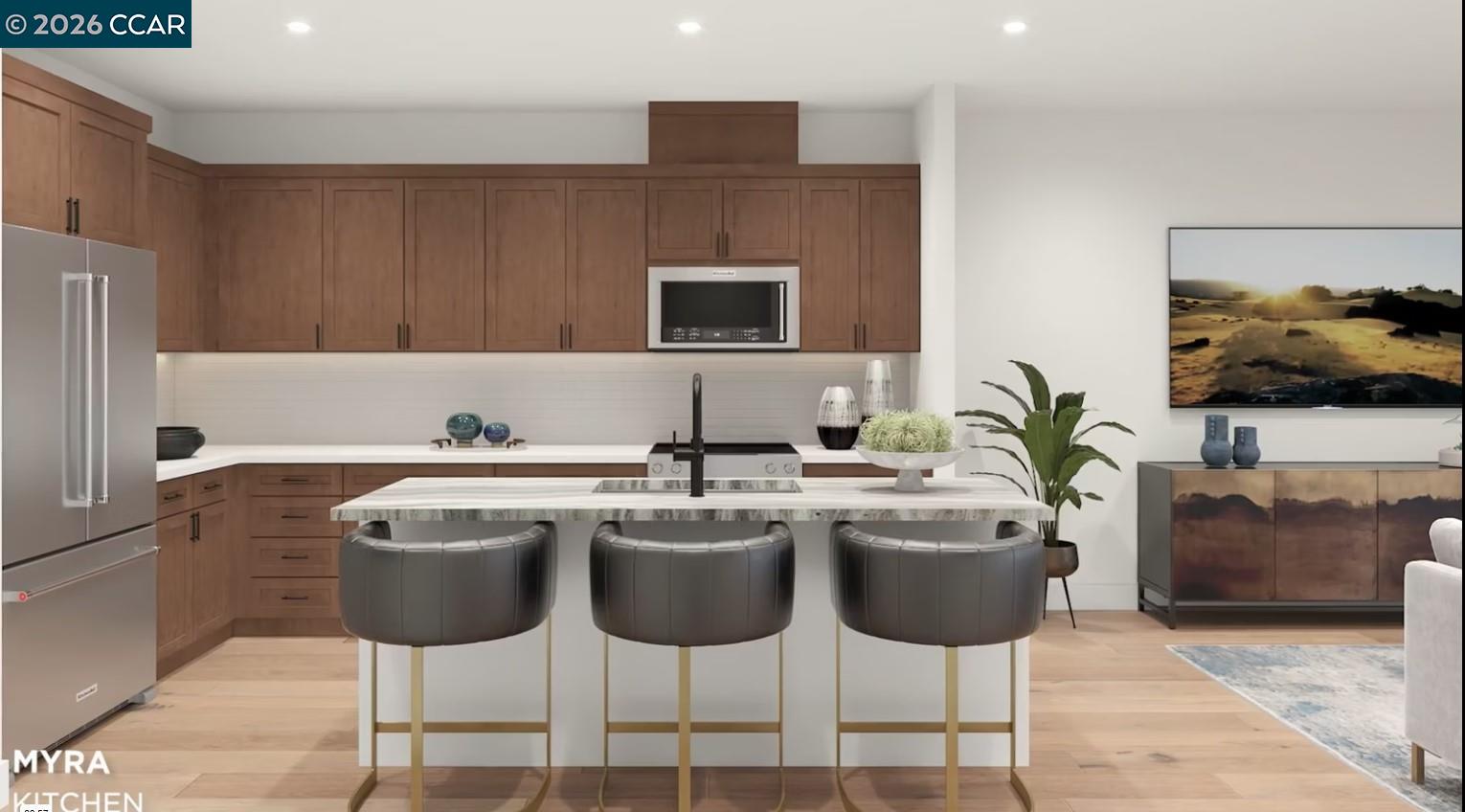 a kitchen with stainless steel appliances a sink and a refrigerator