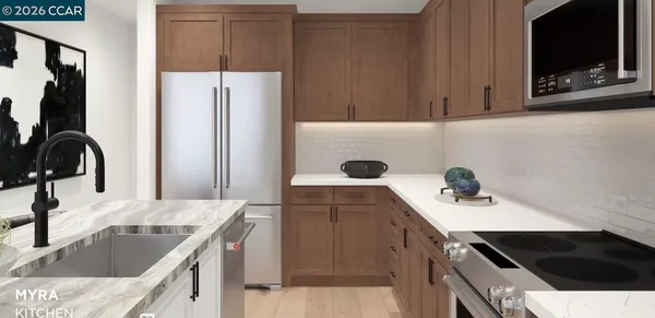 a kitchen with a sink stove and refrigerator