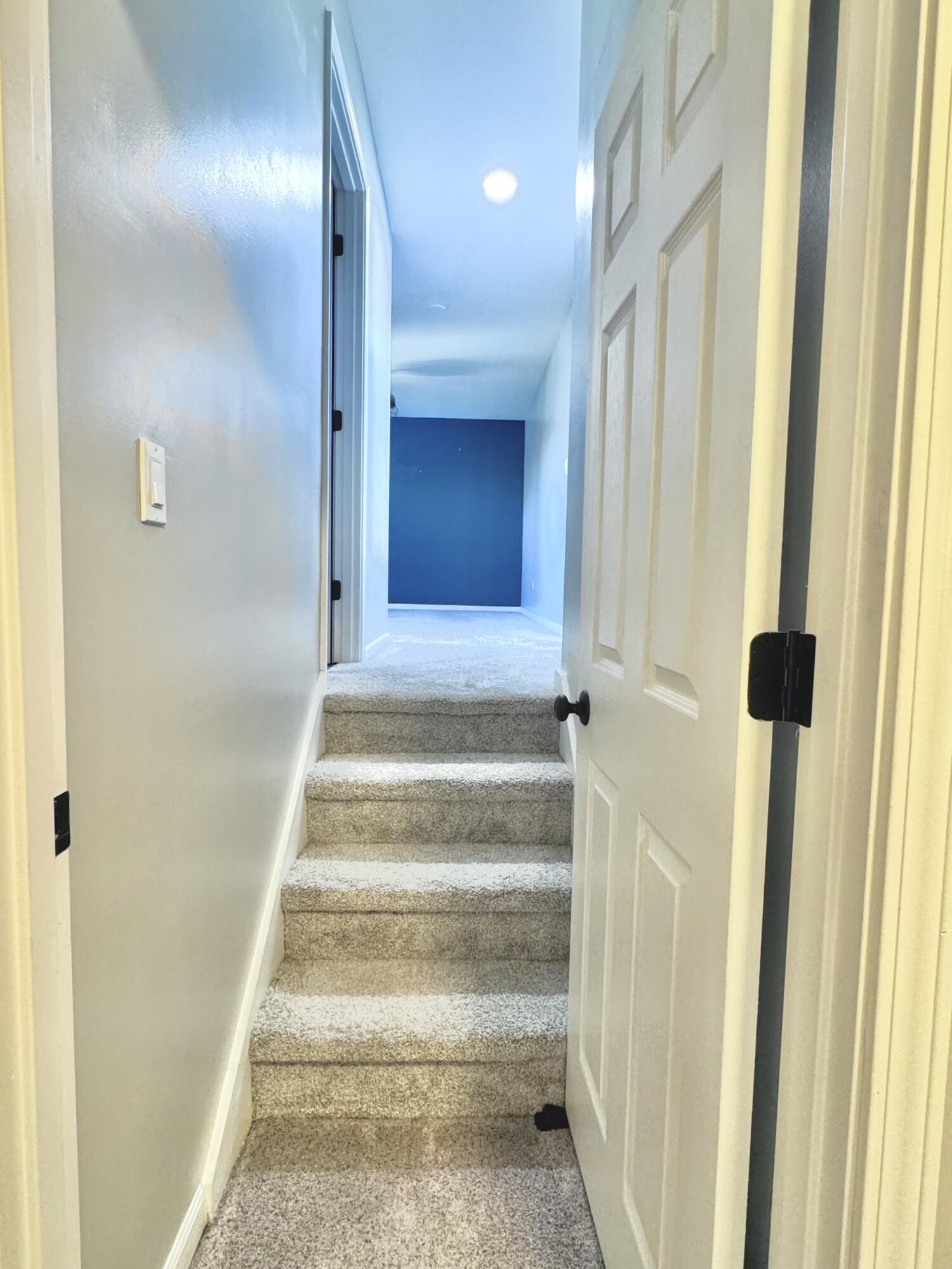 3429 42nd Street Highland, IN 46322 - Photo 20 of 42 a view of staircase with black carpet