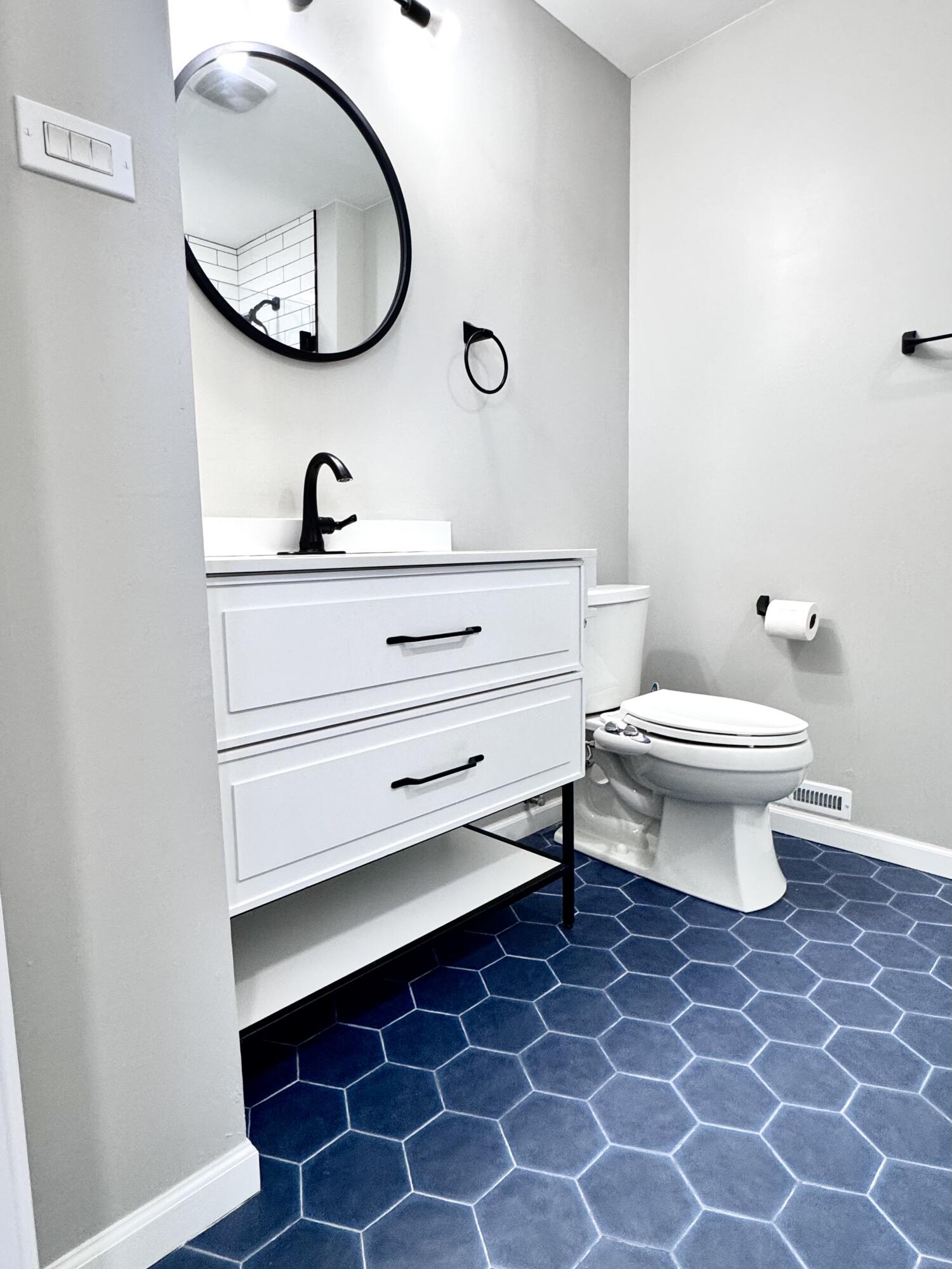 3429 42nd Street Highland, IN 46322 - Photo 26 of 42 a bathroom with a toilet a sink and a mirror