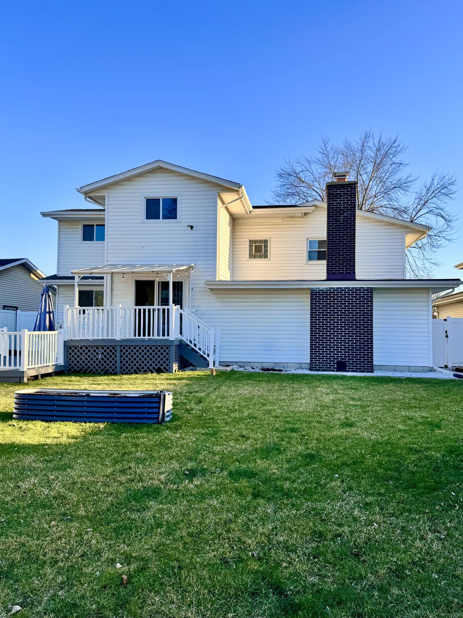 3429 42nd Street Highland, IN 46322 - Photo 37 of 42 a front view of a house with garden