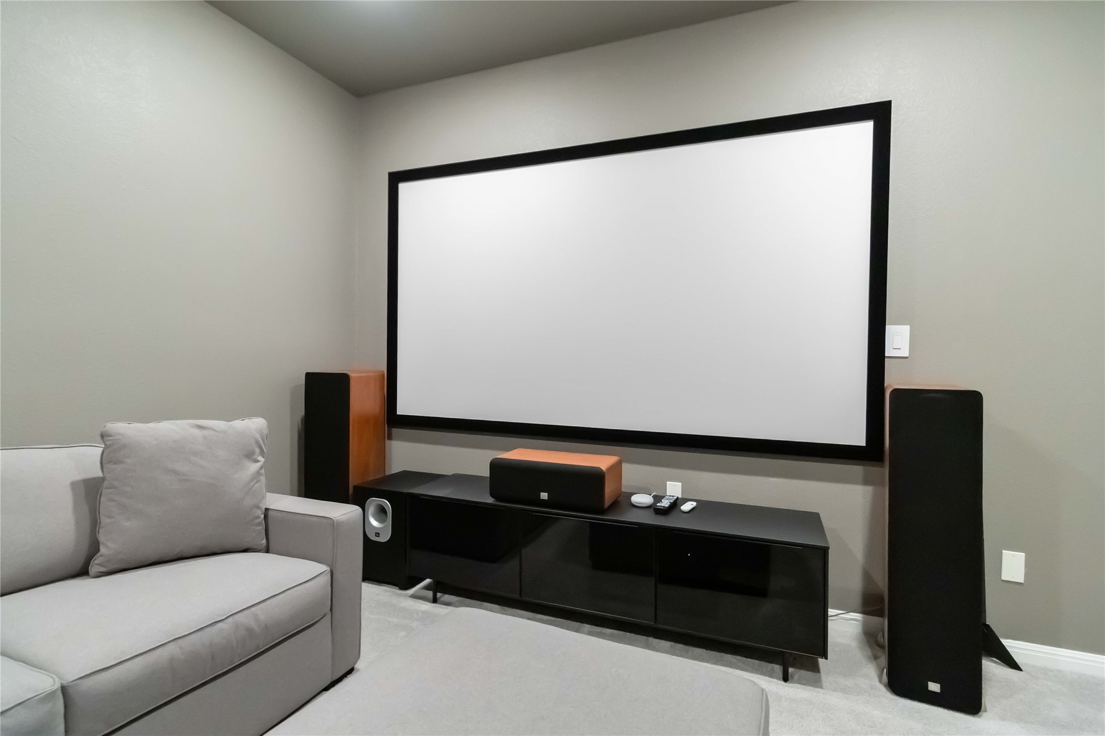 4705 Modena Bay Bend Leander, TX 78641 - Photo 32 of 40 Home theater room featuring carpet floors and baseboards