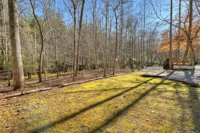 a view of a backyard of a house
