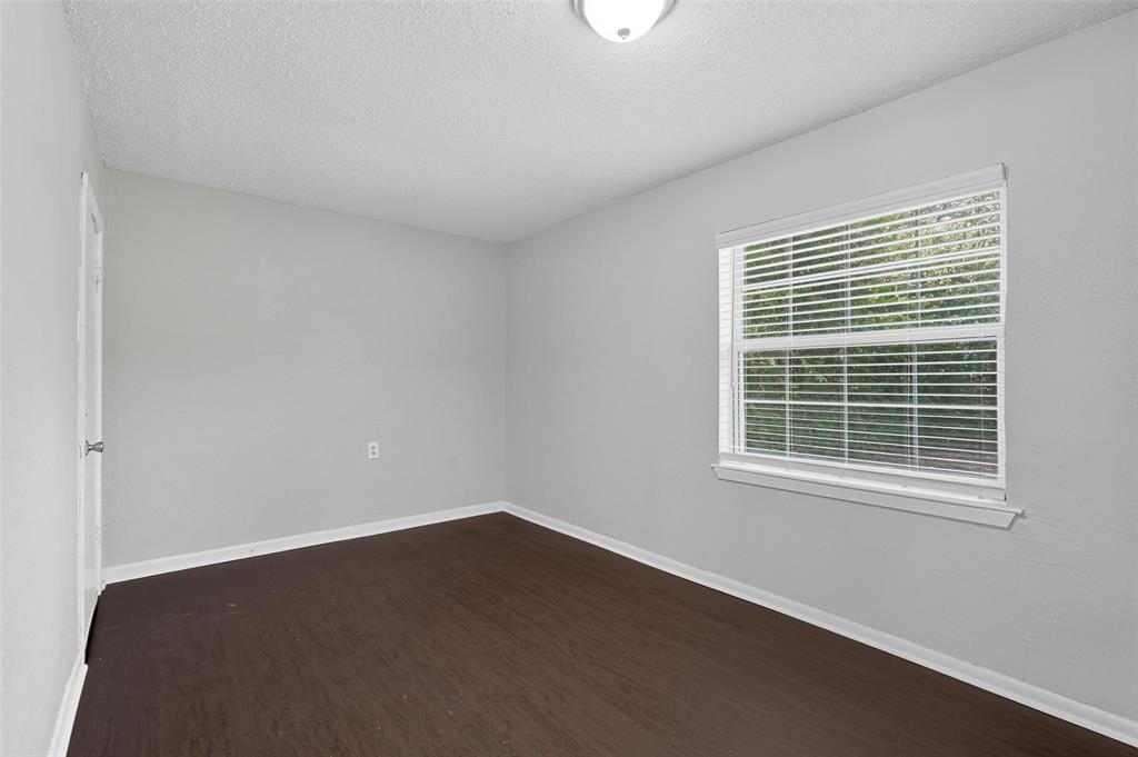 3211 Gus Thomasson Road Dallas, TX 75228 - Photo 11 of 23 a view of a room that has a window in it