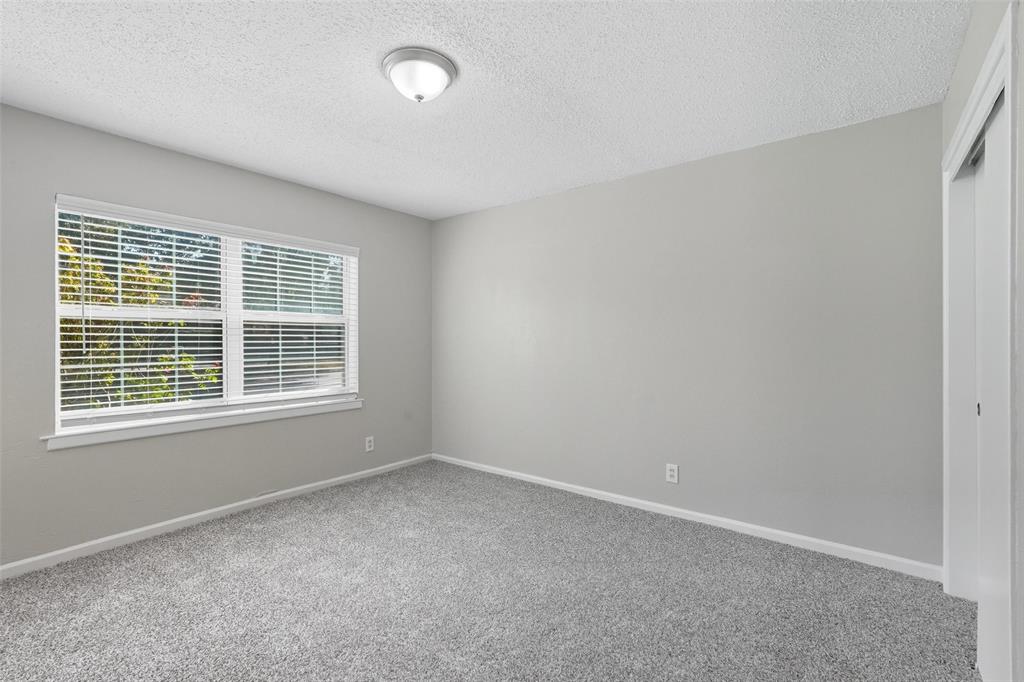 3211 Gus Thomasson Road Dallas, TX 75228 - Photo 14 of 23 an empty room with a window