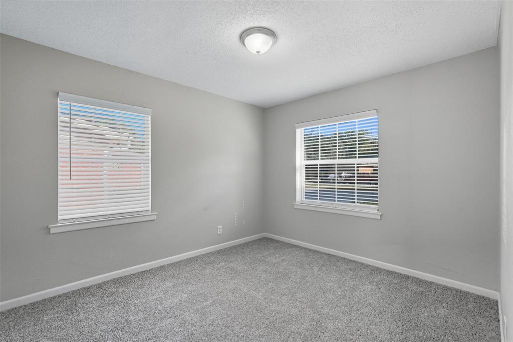 3211 Gus Thomasson Road Dallas, TX 75228 - Photo 15 of 23 an empty room with a window