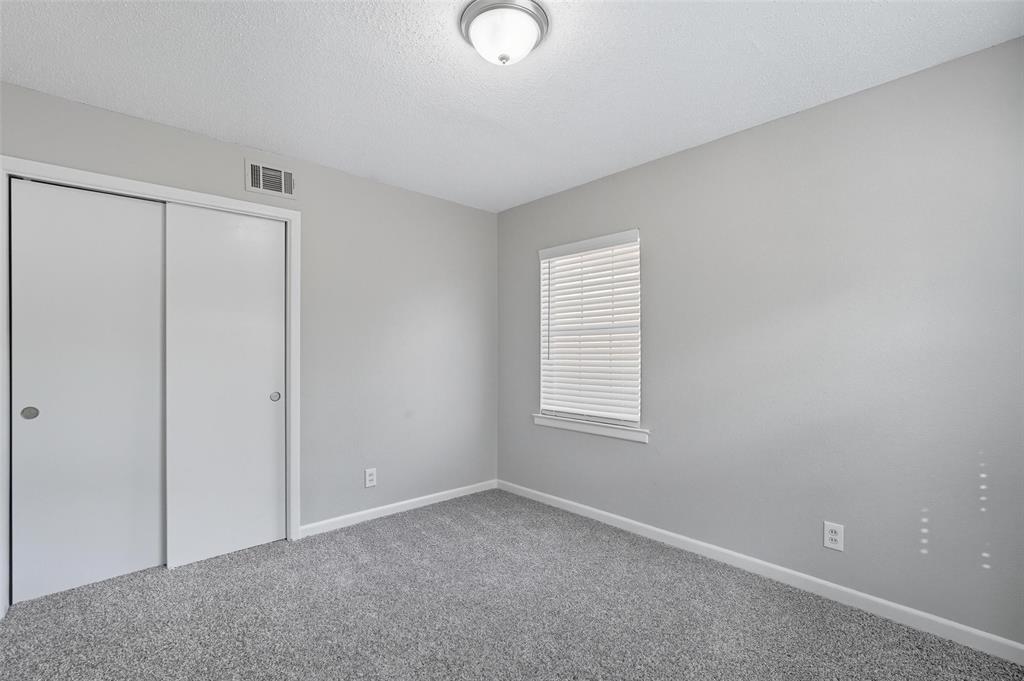 3211 Gus Thomasson Road Dallas, TX 75228 - Photo 16 of 23 an empty room with windows and closet