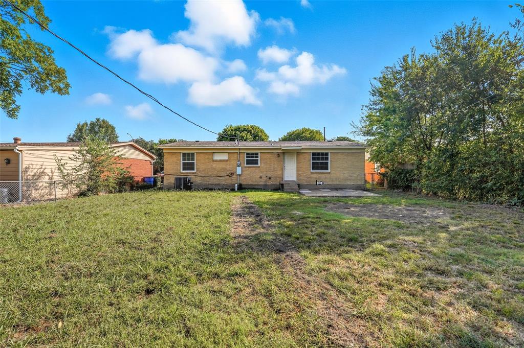 3211 Gus Thomasson Road Dallas, TX 75228 - Photo 21 of 23 a front view of a house with a yard