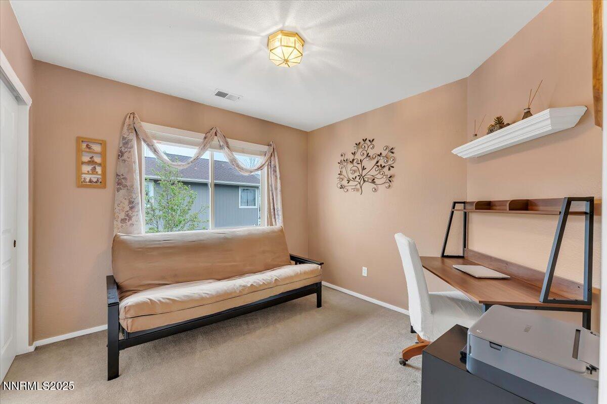 55 Ghost Rider Court Reno, NV 89511 - Photo 17 of 29 a living room with furniture and a window