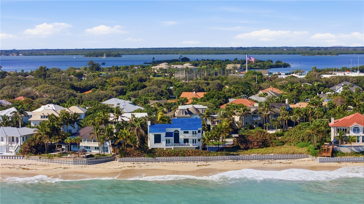 1976 Ocean Ridge Circle Vero Beach, FL 32963 - Photo 2 of 7 a view of a city with tall buildings