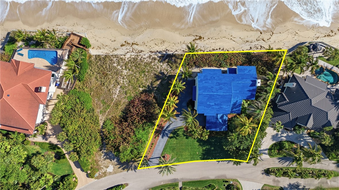 1976 Ocean Ridge Circle Vero Beach, FL 32963 - Photo 7 of 7 an aerial view of houses with yard