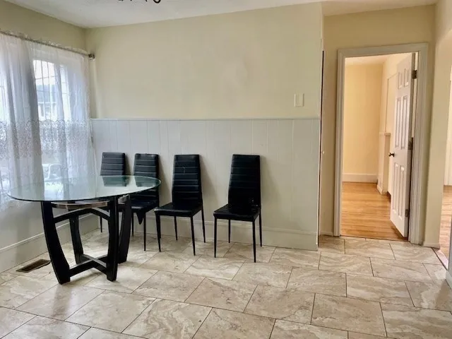 a view of a livingroom with furniture and window