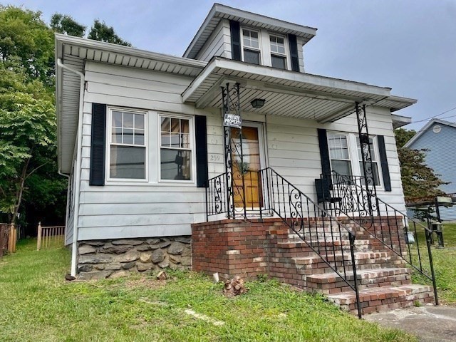 259 Massasoit Road Worcester, MA 01604 - Photo 20 of 23 a front view of a house with garden