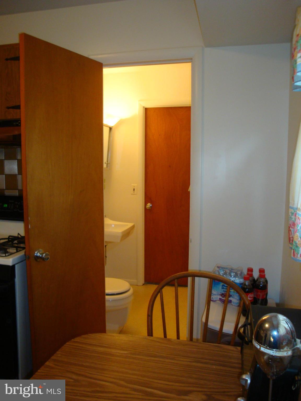 713 Tupelo Road Edgewood, MD 21040 - Photo 8 of 18 a room with a bed and wooden floor