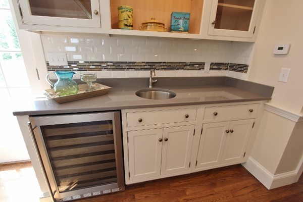 1500 South County Road Barnstable, MA 02655 - Photo 12 of 30 a kitchen with a sink and cabinets