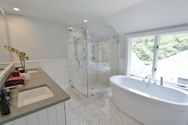 1500 South County Road Barnstable, MA 02655 - Photo 22 of 30 a bathroom with a tub sink and shower