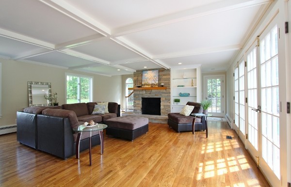 1500 South County Road Barnstable, MA 02655 - Photo 4 of 30 a living room with fireplace furniture and a large window