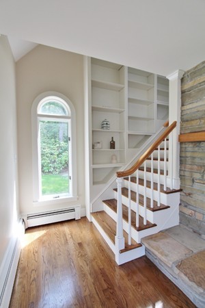 1500 South County Road Barnstable, MA 02655 - Photo 5 of 30 a view of entryway with wooden floor and front door