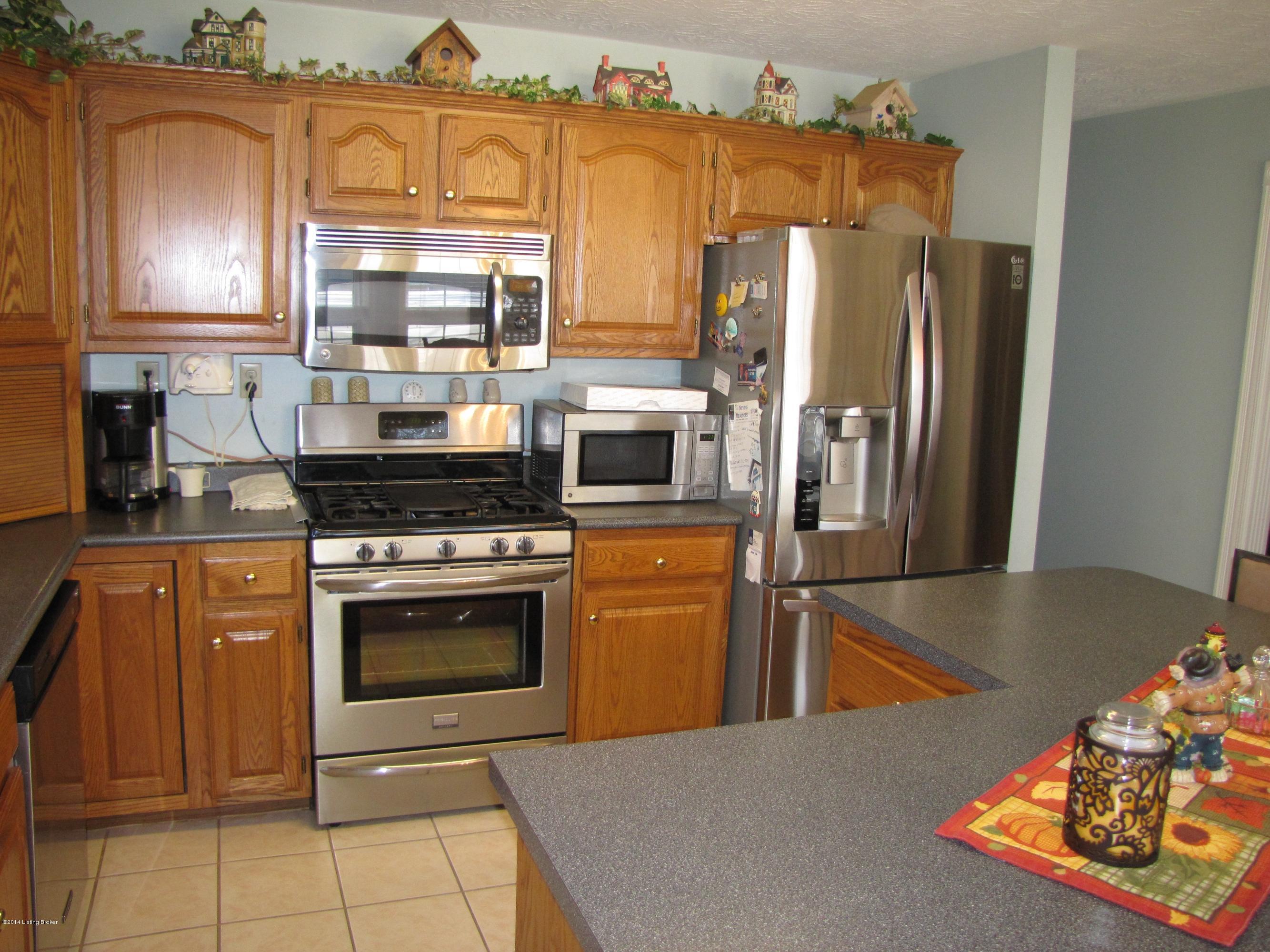 218 Fox Run Road Pendleton, KY 40055 - Photo 11 of 54 The kitchen is dressed with gleaming stainless steel appliances.