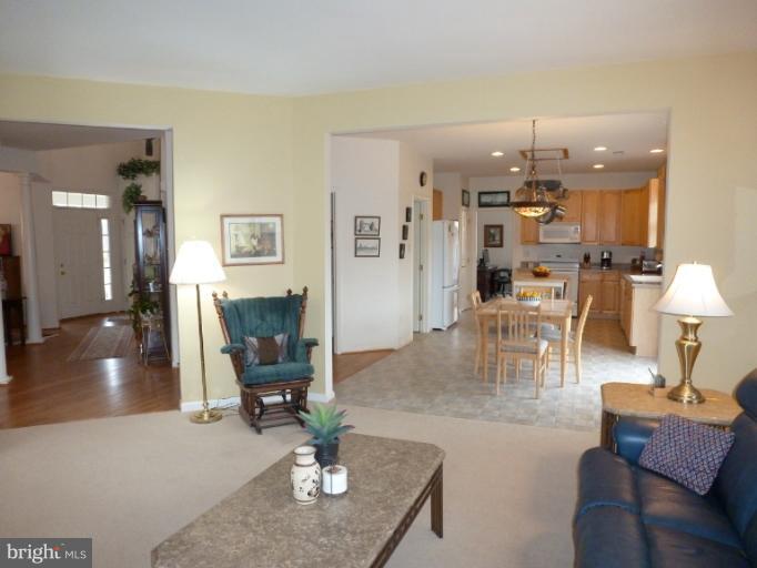 1999 Long Corner Road Mount Airy, MD 21771 - Photo 15 of 27 a living room with furniture and wooden floor