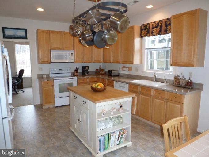 1999 Long Corner Road Mount Airy, MD 21771 - Photo 22 of 27 a kitchen with a sink stove and refrigerator