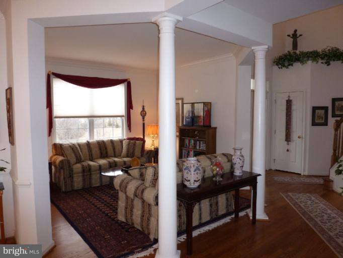1999 Long Corner Road Mount Airy, MD 21771 - Photo 23 of 27 a living room with furniture and a window