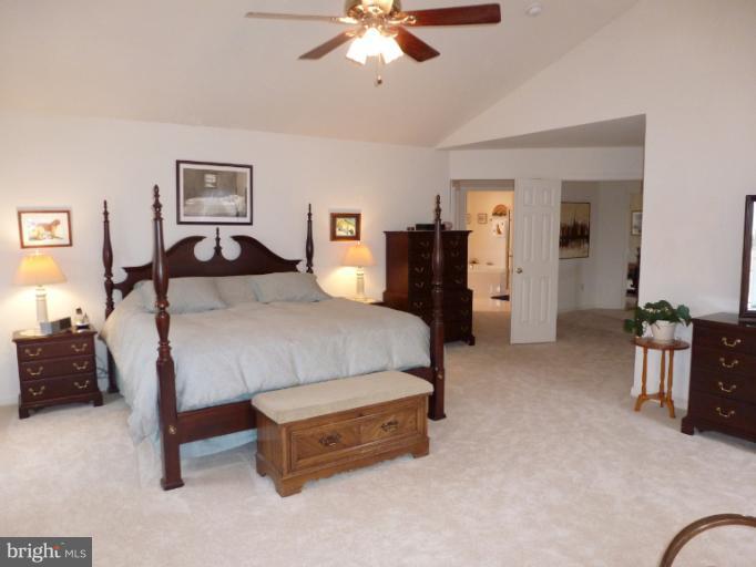 1999 Long Corner Road Mount Airy, MD 21771 - Photo 24 of 27 a bedroom with a bed and dresser