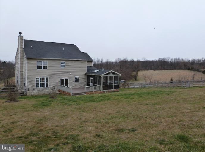 1999 Long Corner Road Mount Airy, MD 21771 - Photo 25 of 27 a view of a house with a yard and a large tree center in it
