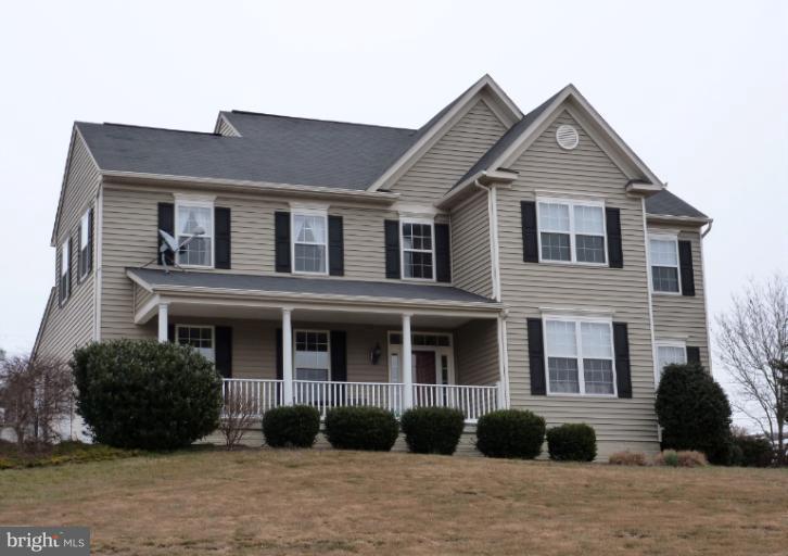 1999 Long Corner Road Mount Airy, MD 21771 - Photo 27 of 27 a front view of a house with a garden