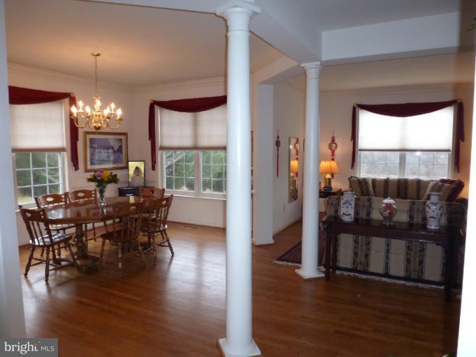 1999 Long Corner Road Mount Airy, MD 21771 - Photo 6 of 27 a view of a dining room with furniture window and wooden floor