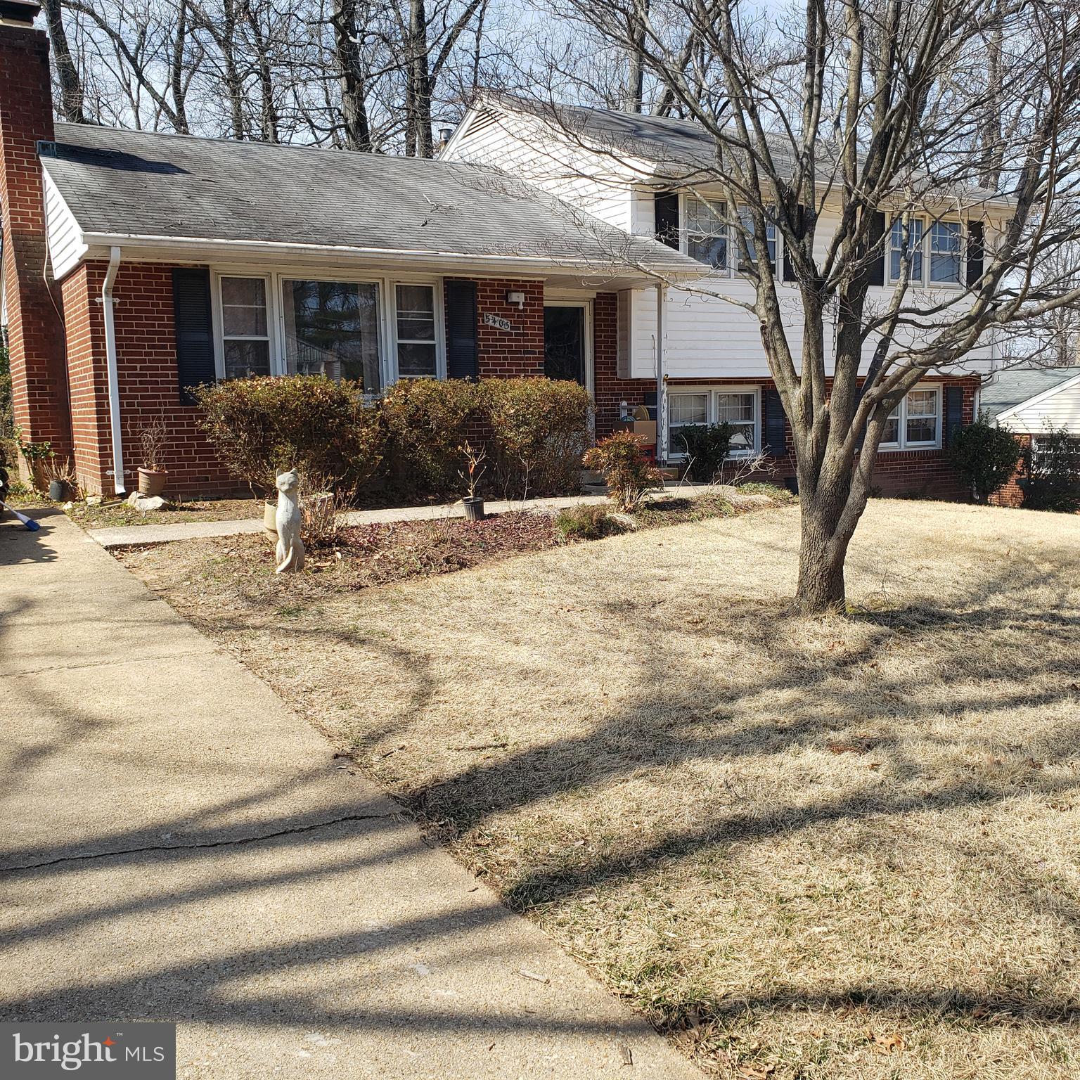 5405 Moultrie Road Springfield, VA 22151 - Photo 3 of 9 a front view of a house with a yard
