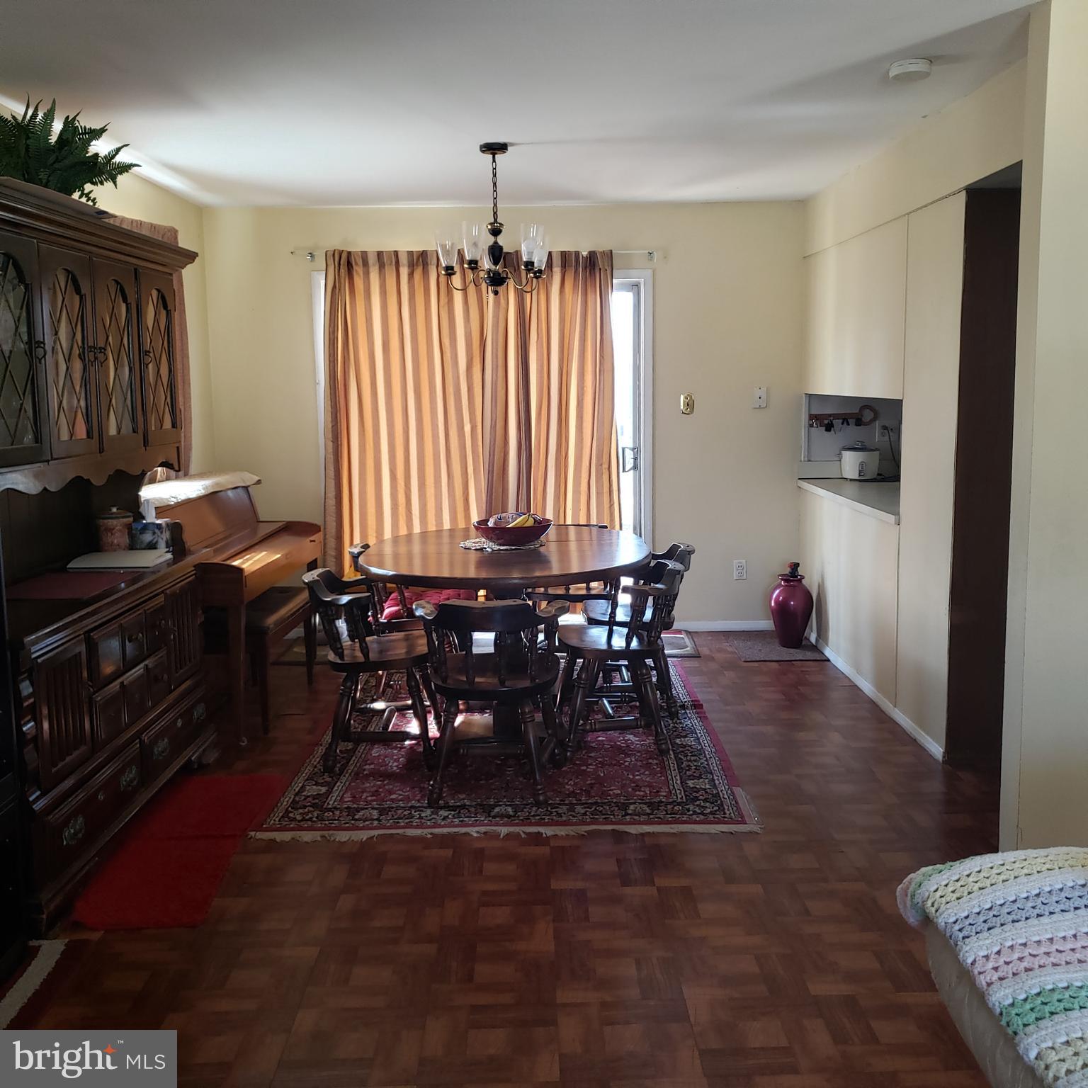 5405 Moultrie Road Springfield, VA 22151 - Photo 7 of 9 a view of a dining room with furniture