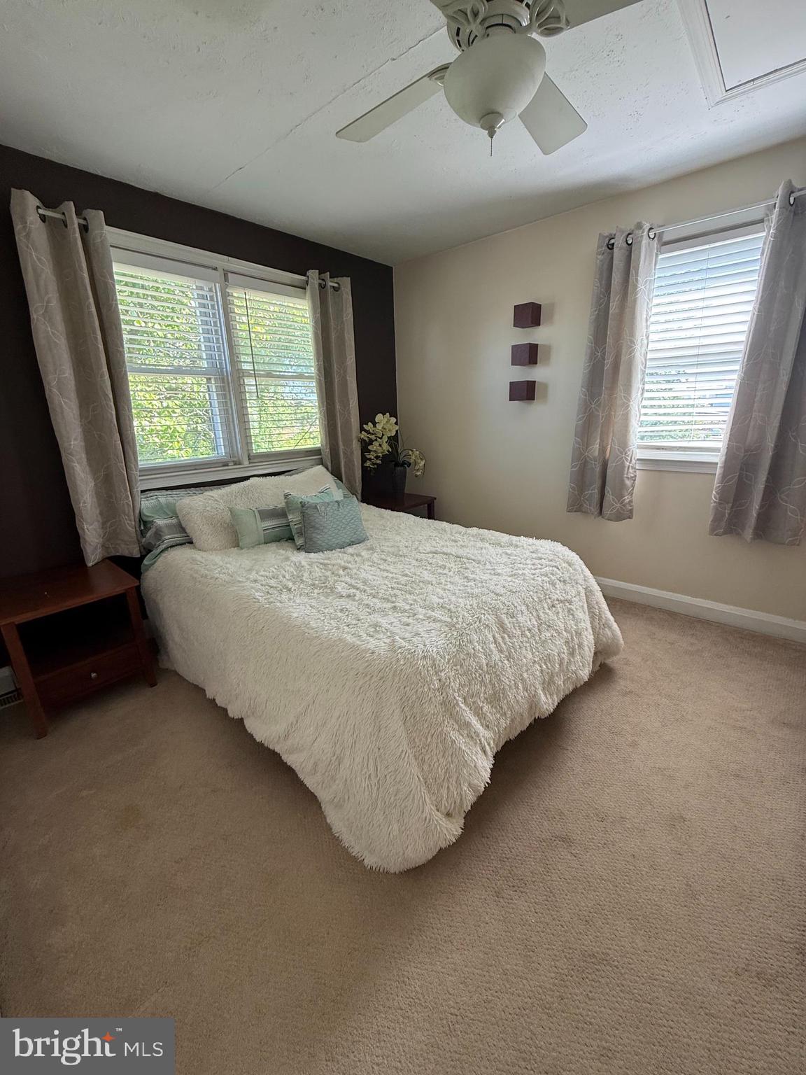 2235 Hawthorne Road Baltimore, MD 21220 - Photo 15 of 35 a bedroom with a bed and window
