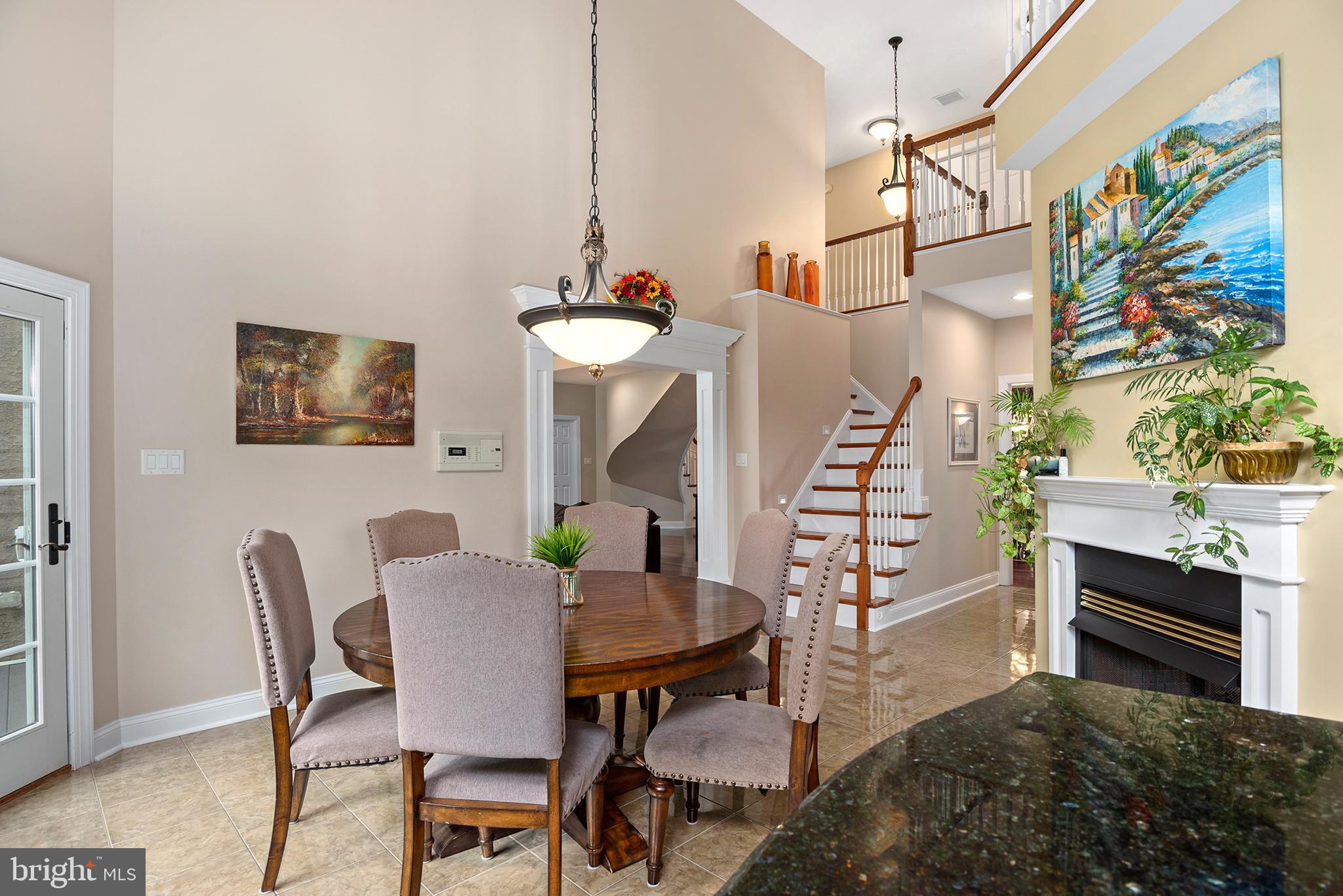 74 Lake Forest Drive Elkton, MD 21921 - Photo 15 of 65 a view of a dining room with furniture and wooden floor