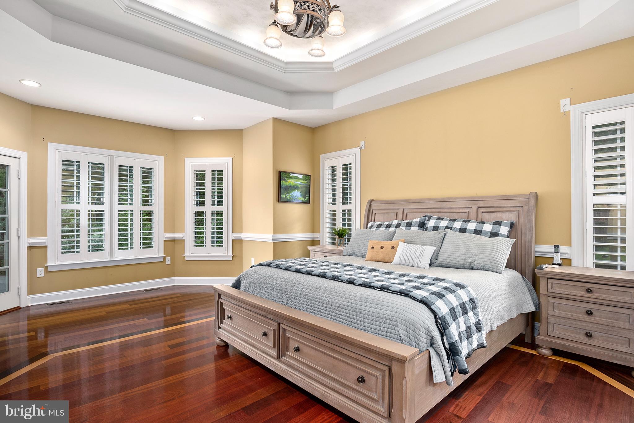 74 Lake Forest Drive Elkton, MD 21921 - Photo 25 of 65 a bedroom with a large bed and a large window