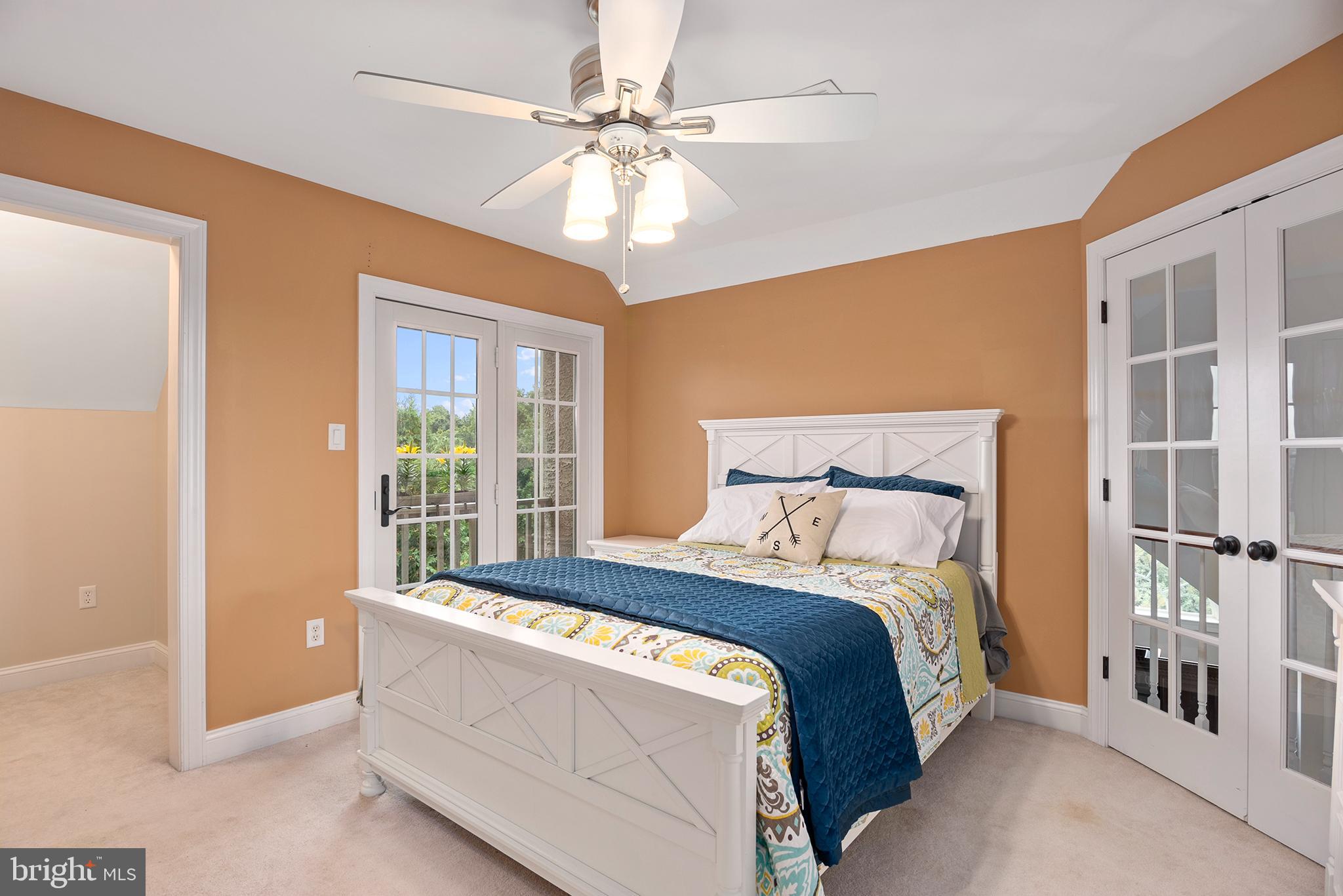 74 Lake Forest Drive Elkton, MD 21921 - Photo 37 of 65 a bed sitting in a bedroom next to a window