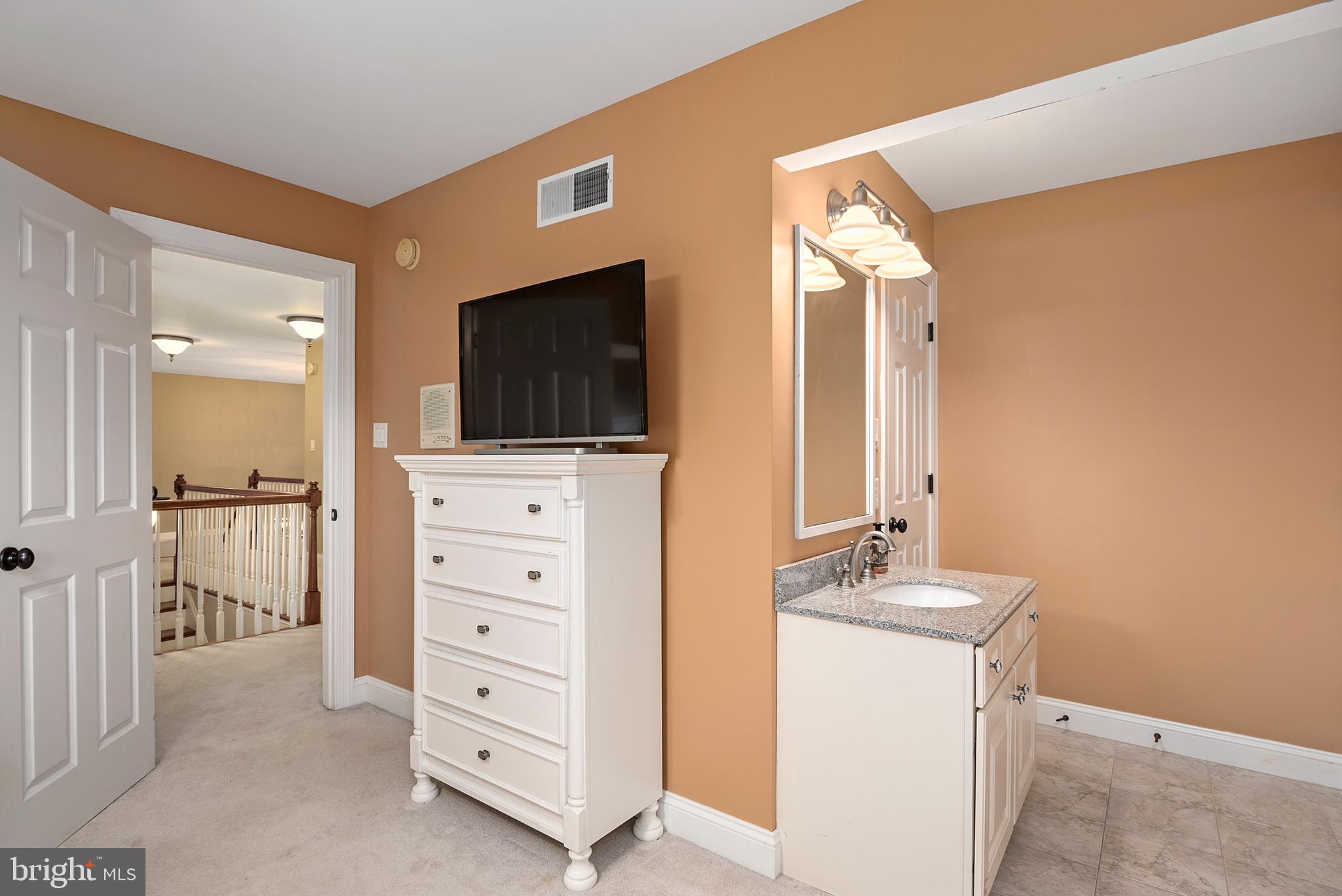 74 Lake Forest Drive Elkton, MD 21921 - Photo 40 of 65 a view of hallway with washer and dryer