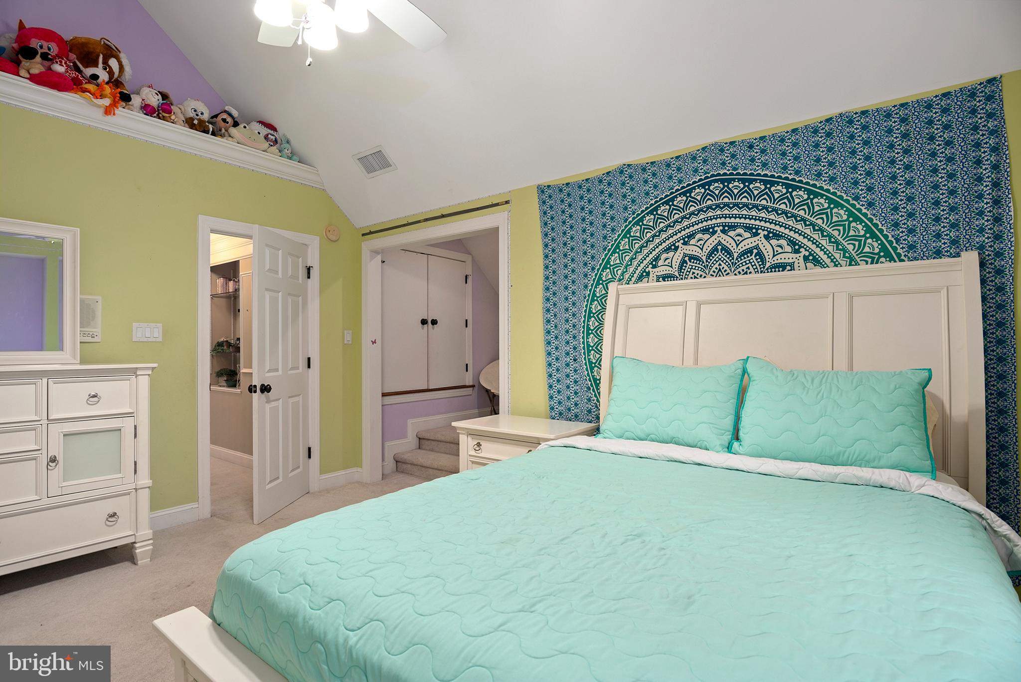 74 Lake Forest Drive Elkton, MD 21921 - Photo 48 of 65 a bedroom with a bed and a mirror