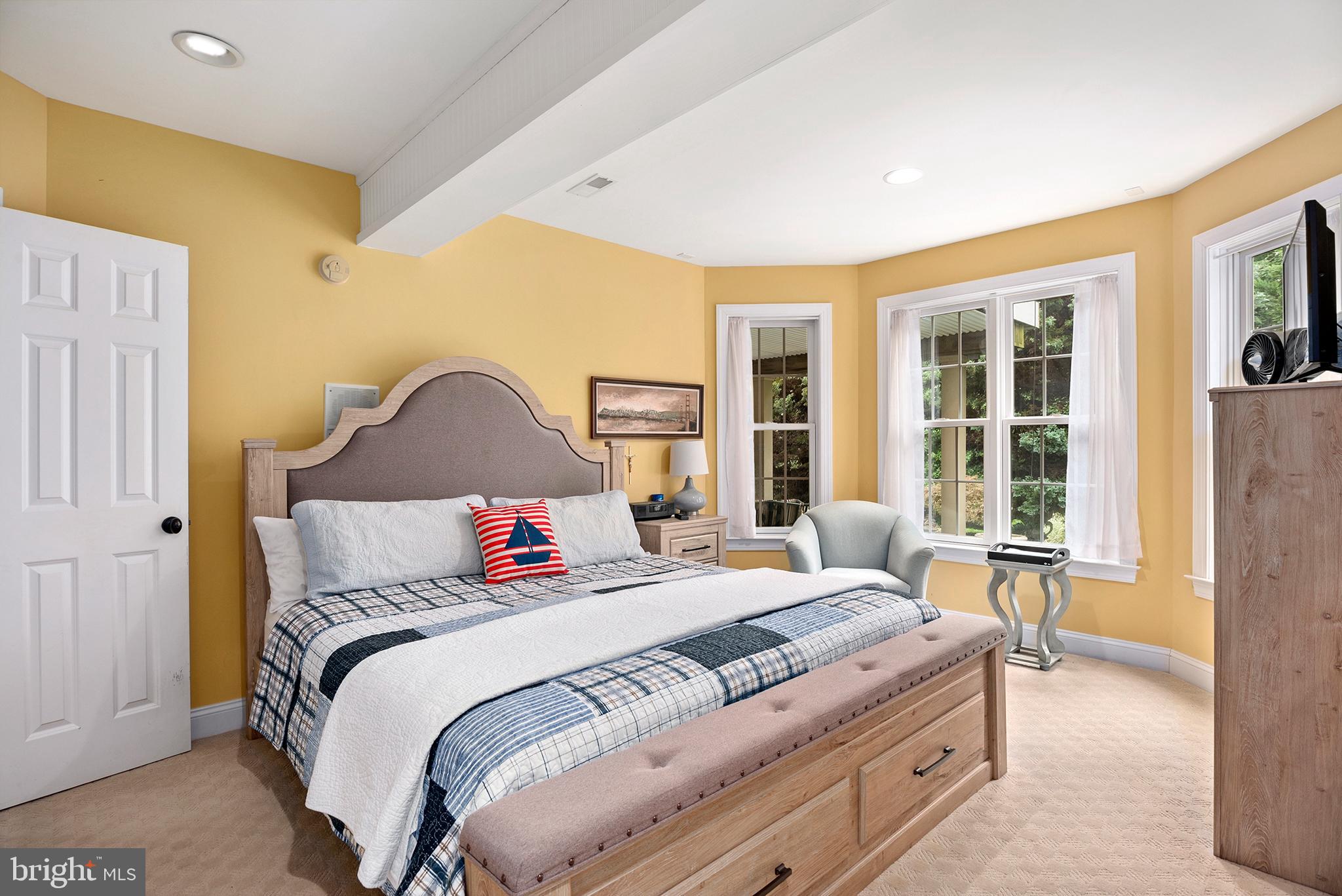 74 Lake Forest Drive Elkton, MD 21921 - Photo 57 of 65 a bedroom with a bed and a large window